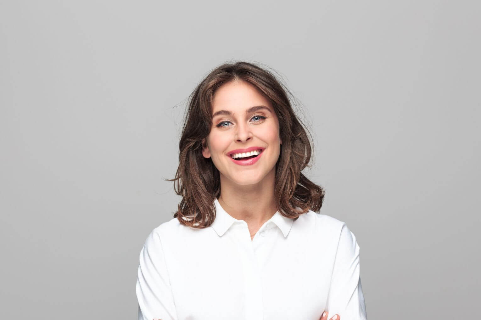woman smiling with dental implants, london