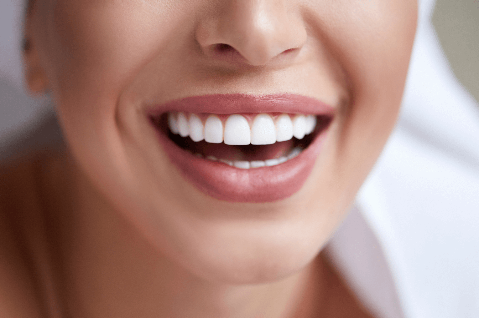 close up of smiling teeth after the dental implant process in Marylebone