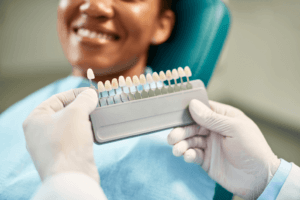 womans smile after being shown teeth whitening results at 19 wimpole street dental practice in Marylebone