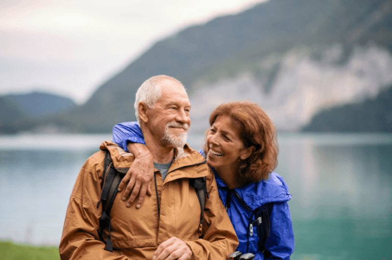 man out with partner considering dental implants at 19 wimpole street